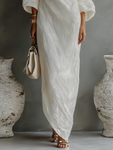 Elegant Flowing Dress in Ivory White with Off-Shoulder